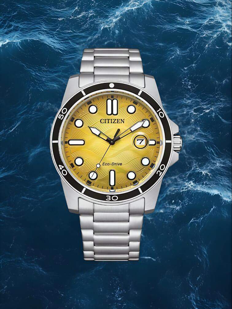 นาฬิกาสีเงินพร้อมหน้าปัดสีเหลืองและการแสดงวันที่