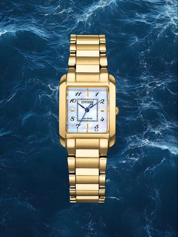 นาฬิกาทองคำทั้งหมดดีไซน์คลาสสิกพร้อมหน้าปัดสีขาวและเข็มสีน้ำเงินเข้ม