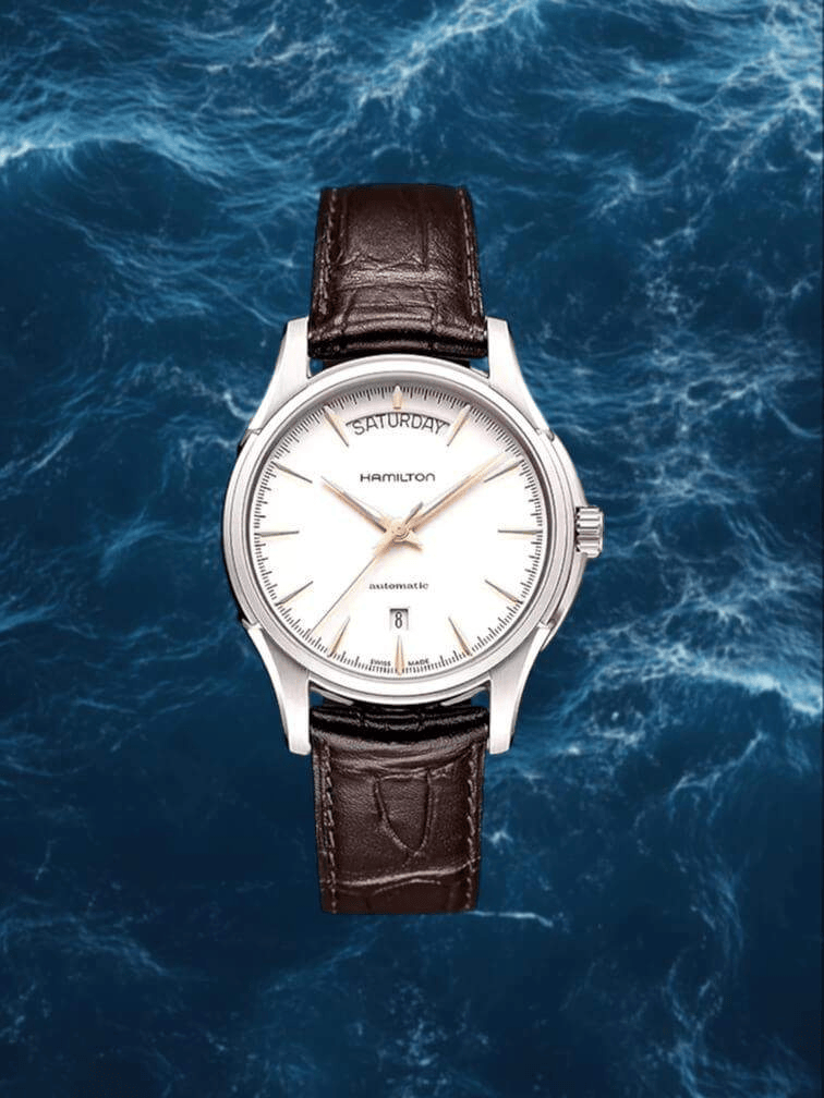 รุ่นสายนาฬิกาสีน้ำตาล หน้าปัดสีขาว ตัวเรือนสีเงิน