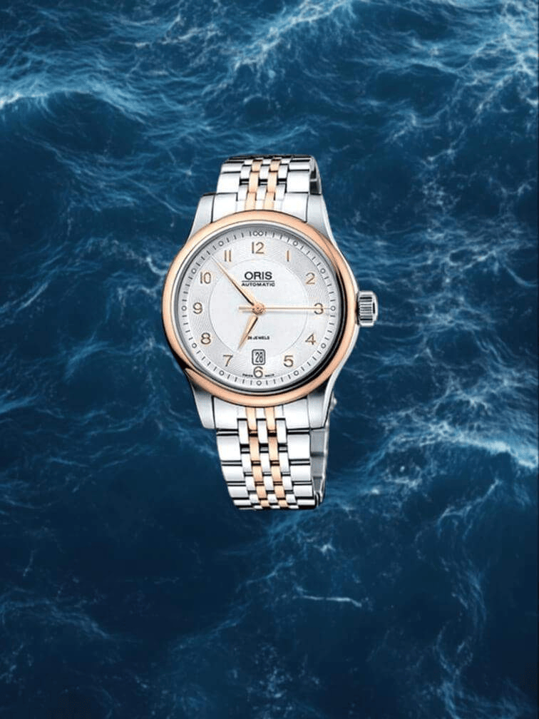 รุ่นสีเงินและทอง หน้าปัดสีขาว แสดงวันที่