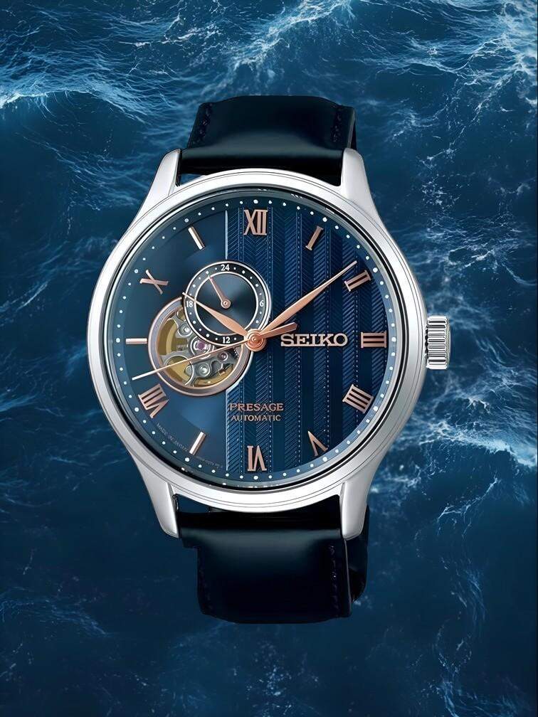 นาฬิกาสีน้ำเงินพร้อมตัวเรือนสีเงิน ดูหรูหราและมีสไตล์ เหมาะสำหรับทั้งการใช้งานประจำวันและงานทางการ