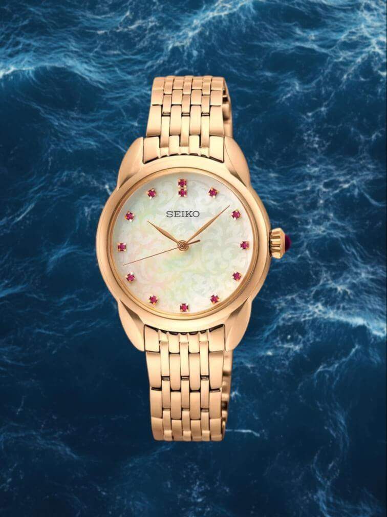 รุ่น ตัวเรือนสีทองทั้งหมด หน้าปัดสีขาวพร้อมลายแดงบนหน้าปัด