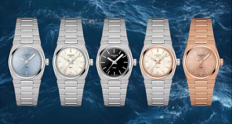 Tissot PRX รุ่นต่างๆ ในสีสันหลากหลาย แสดงหน้าปัดสีสดใส เช่น สีน้ำเงิน สีเขียว สีดำ และอื่นๆ พร้อมเข็มและหน้าจอแสดงวันที่ที่เข้ากัน มอบความหลากหลายและสไตล์ที่แตกต่าง