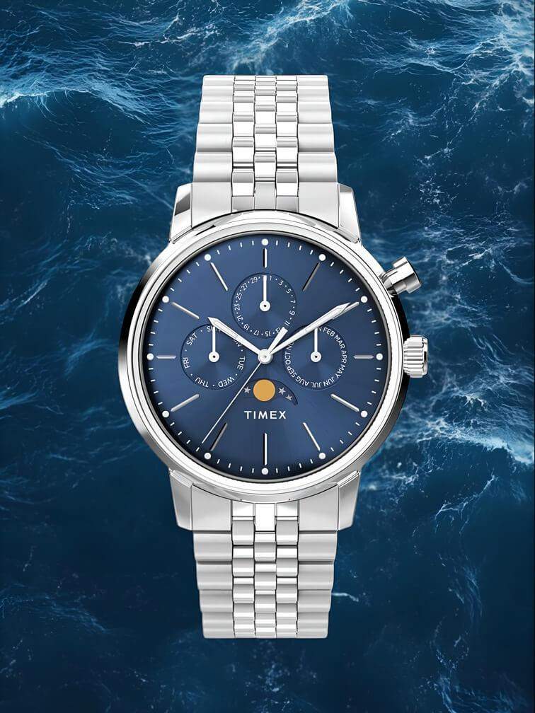 นาฬิกาโครโนกราฟทั้งหมดสีเงินพร้อมหน้าปัดสีน้ำเงินเข้ม ดีไซน์หรูหราทันสมัย