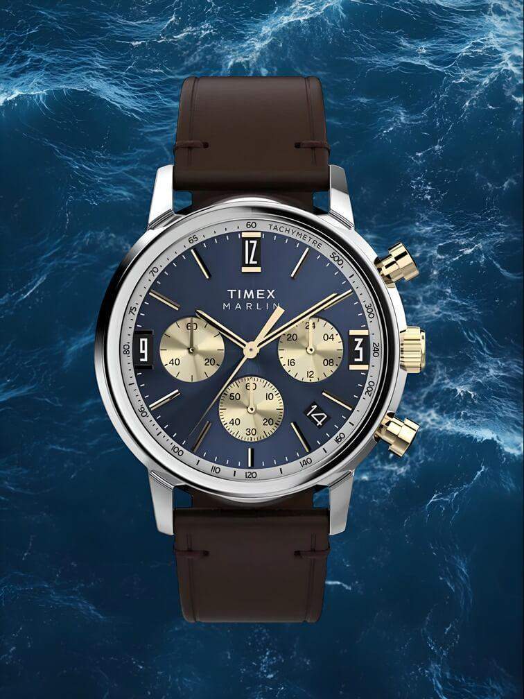 นาฬิกาตัวเรือนสีเงินพร้อมฟังก์ชันโครโนกราฟหน้าปัดสีน้ำเงินเข้มและสายหนังสีดำ ดีไซน์หรูหราและทันสมัย