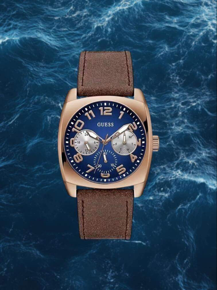 นาฬิกา XANDER หน้าปัดน้ำเงิน ตัวเรือนทอง เข็มทอง สายสีน้ำตาล และฟังก์ชั่นโครโนกราฟ